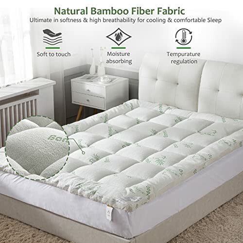 Bamboo fiber mattress topper on bed with features: soft, moisture absorbing, temperature regulation.