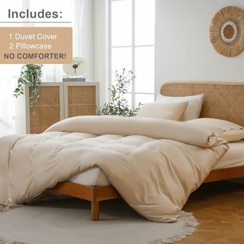 Beige duvet cover set on bed in a bright room with plants and wicker decor.