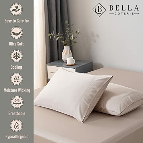 Bella Coterie bamboo pillowcase on bed with care icons.