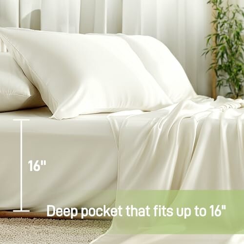 Cream bed sheets with 16-inch deep pocket and pillows.